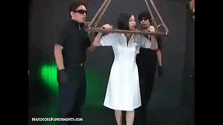 Horny Asian Submissive Bound In Uncomfortable Stocks And Driven